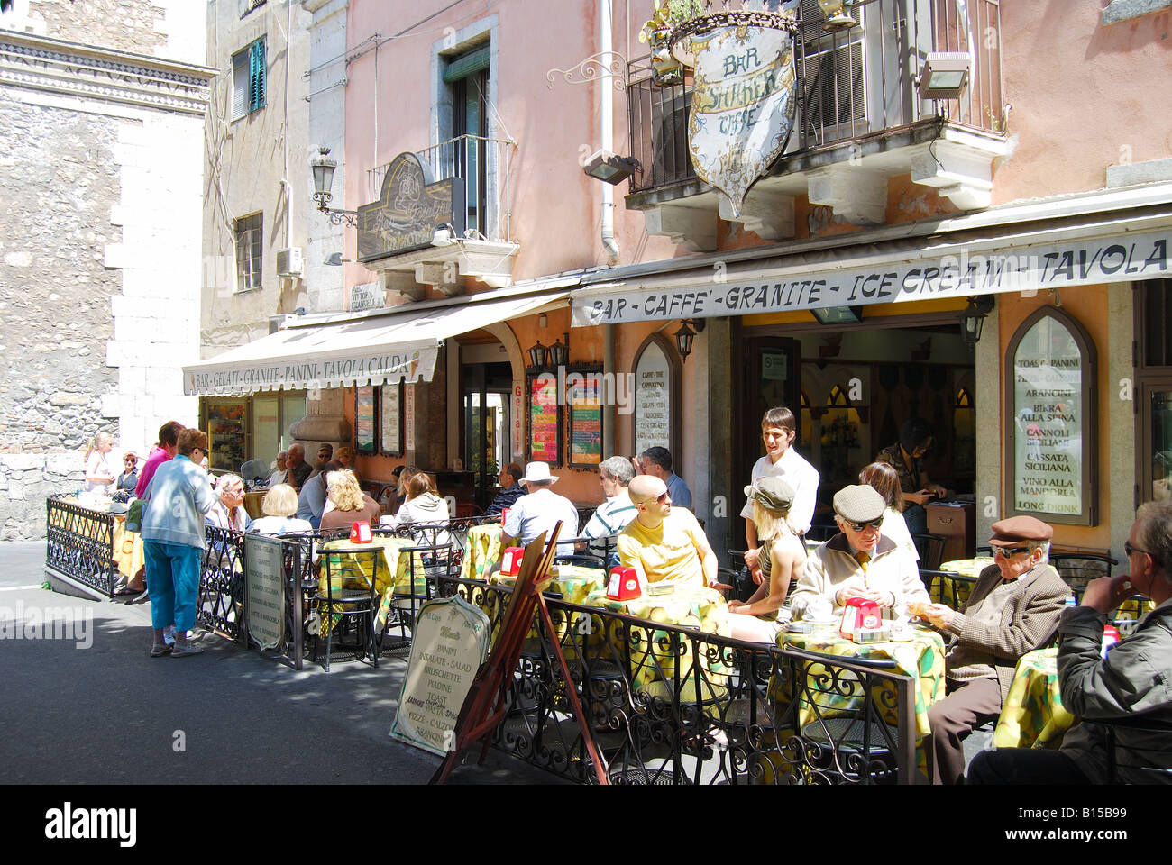 Street cafe, Taormina, Messina Province, Sicily, Italy Stock Photo