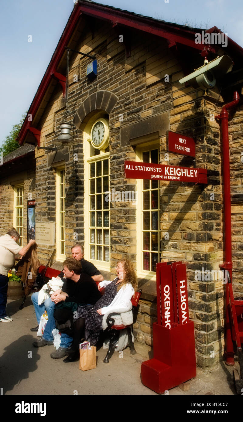 Passengers waiting on Haworth Station for a steam train ride on the Keighley and Worth Valley line Stock Photo