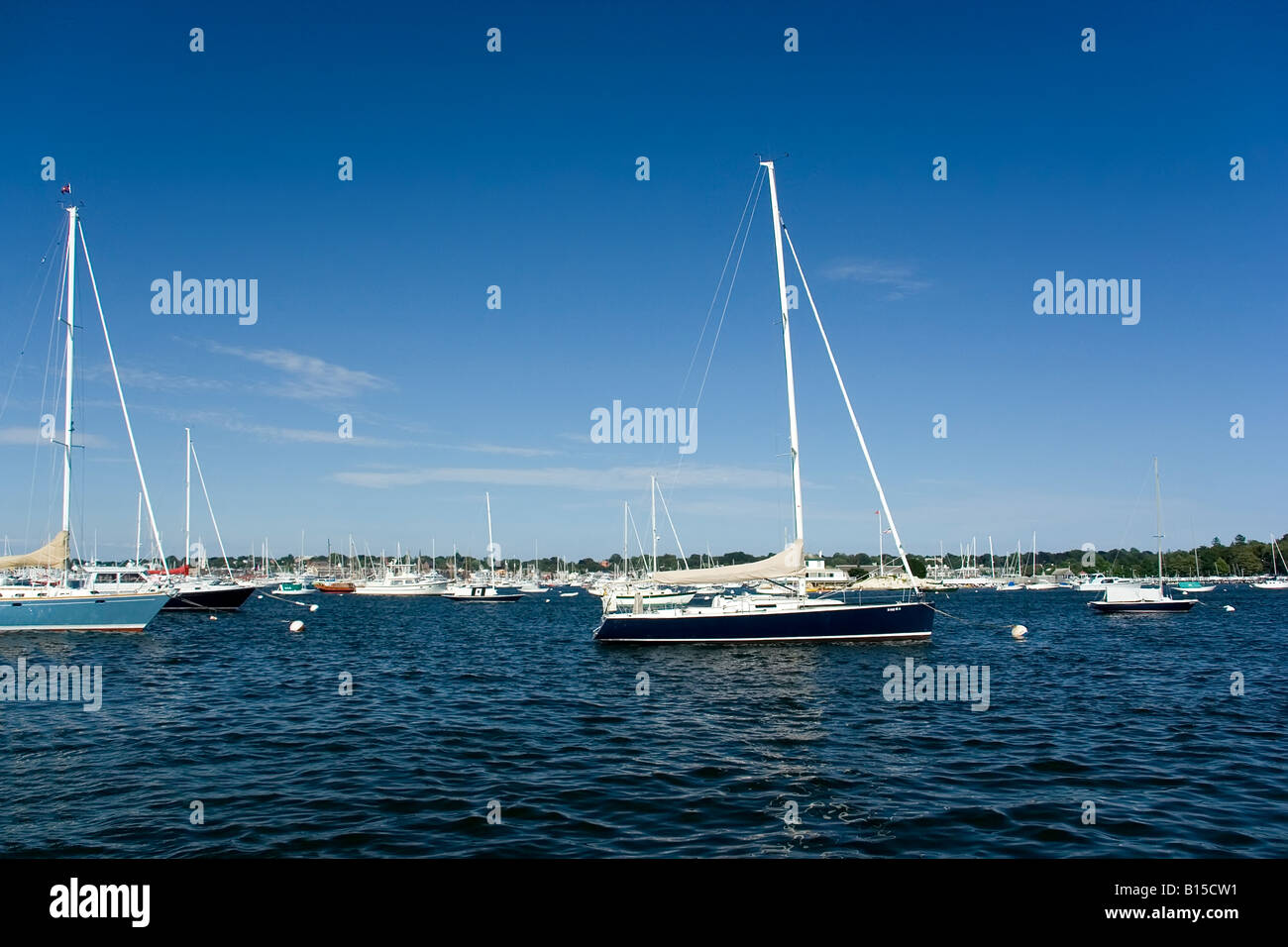 Photograph of sailboats moored in a harbor Stock Photo - Alamy