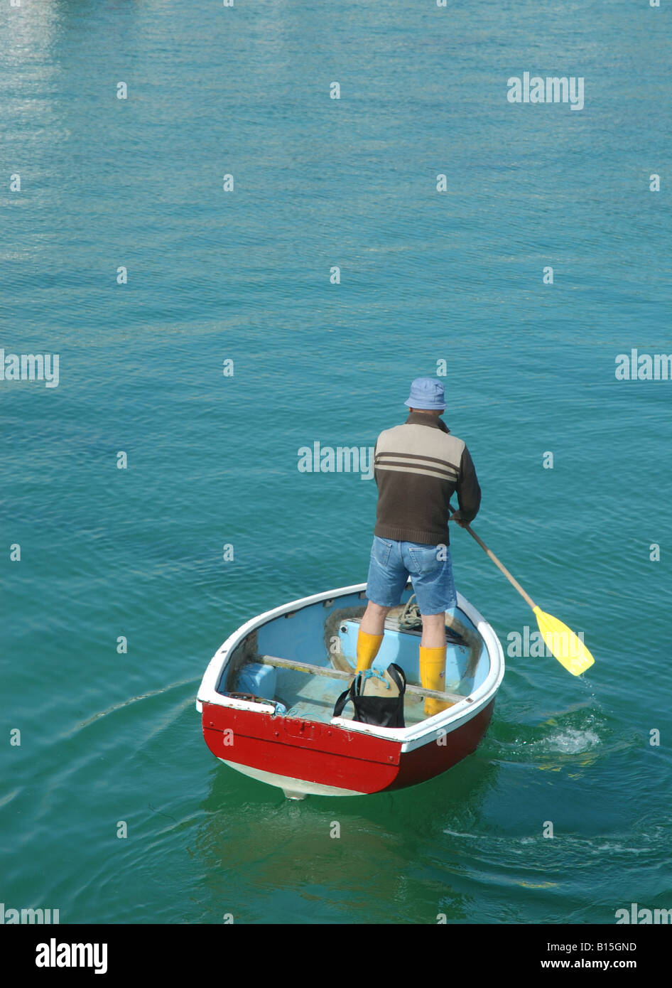 Man with rowing boat hi-res stock photography and images - Alamy