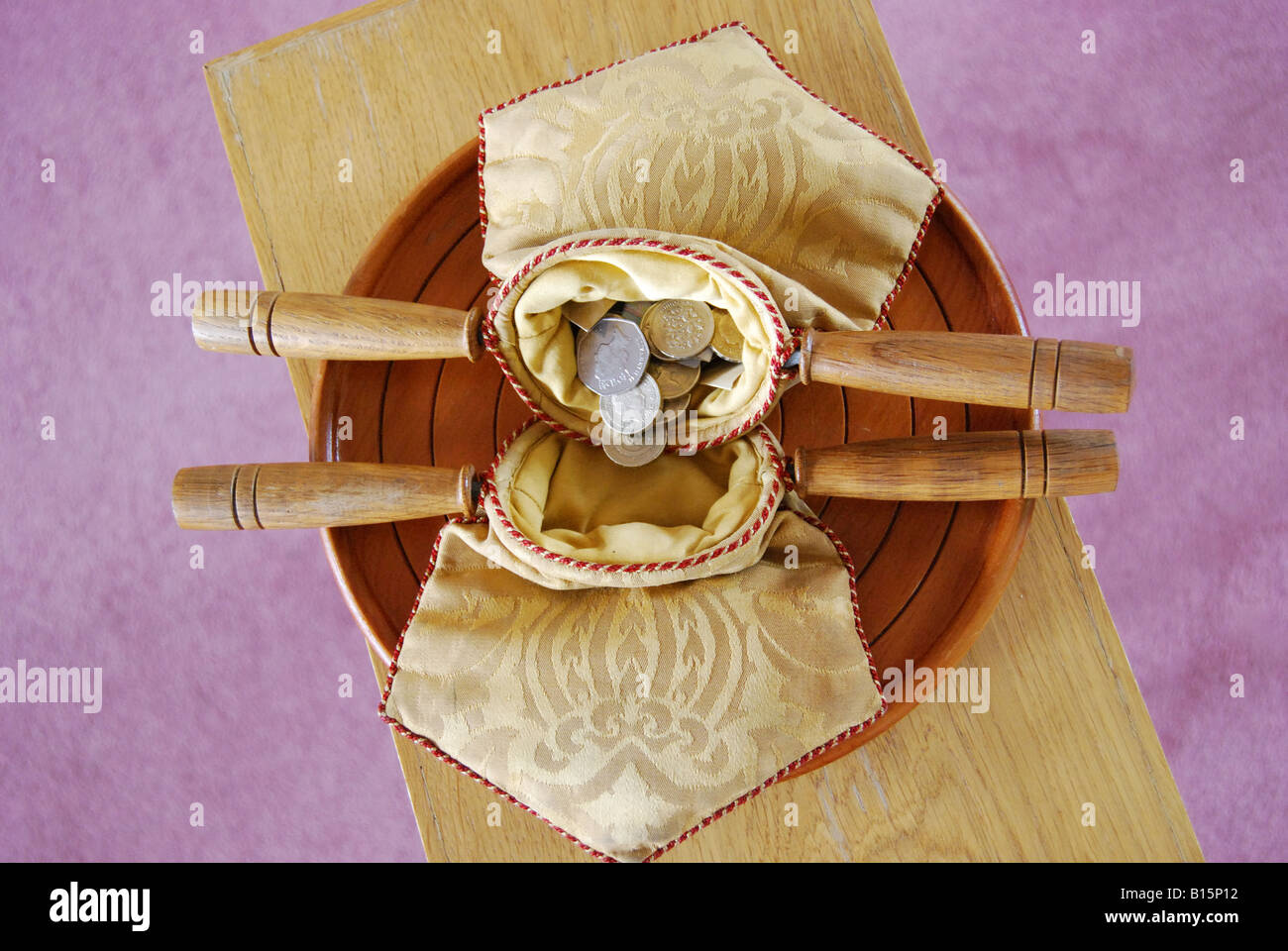 Donation bag, catholic christening, Gosport, Hampshire, England, United Kingdom Stock Photo Alamy