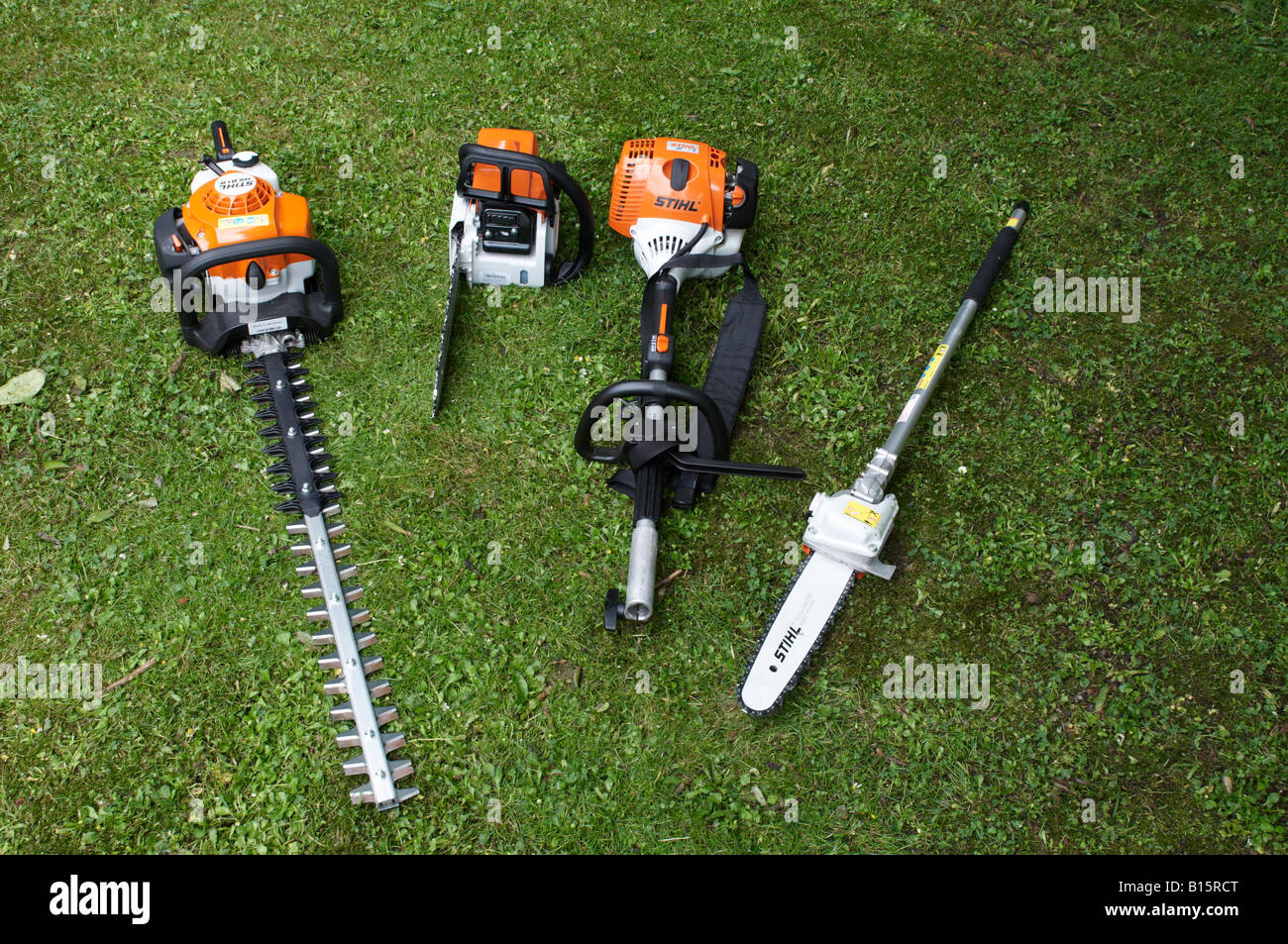 Stihl power tools lined up on the lawn Stihl MS 180 Combi engine KM 90