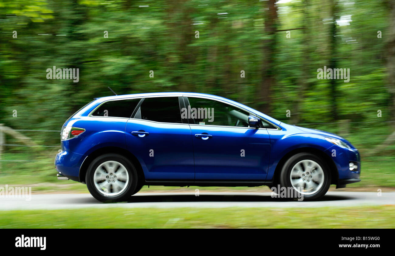 2008 Mazda CX7 driving on country road Stock Photo
