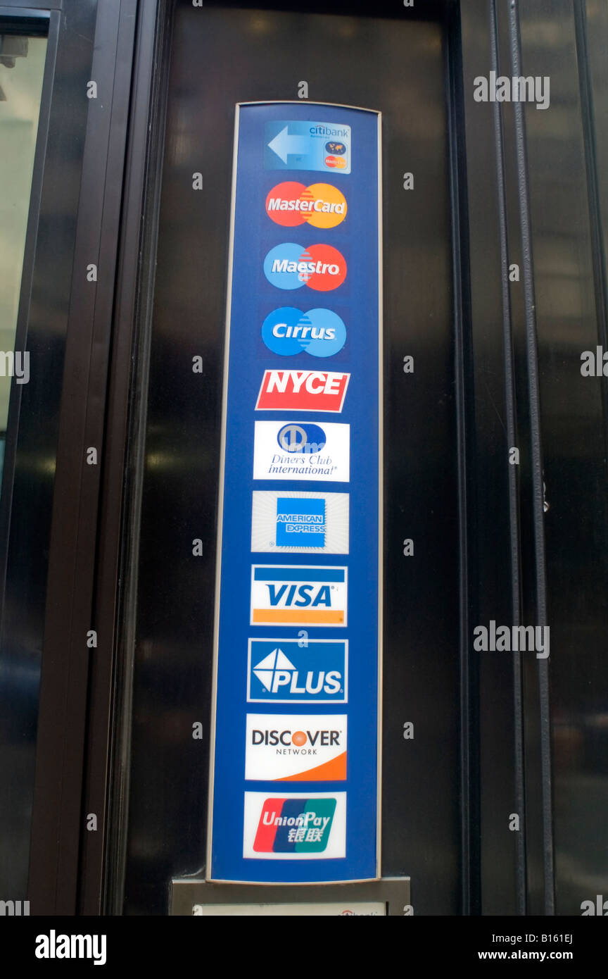 Logos for credit and debit cards in the lobby of a Citibank in New York Stock Photo