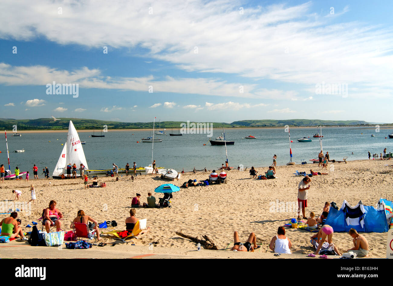 People on Aberdyfi Beach Dyfi Estuary Stock Photo