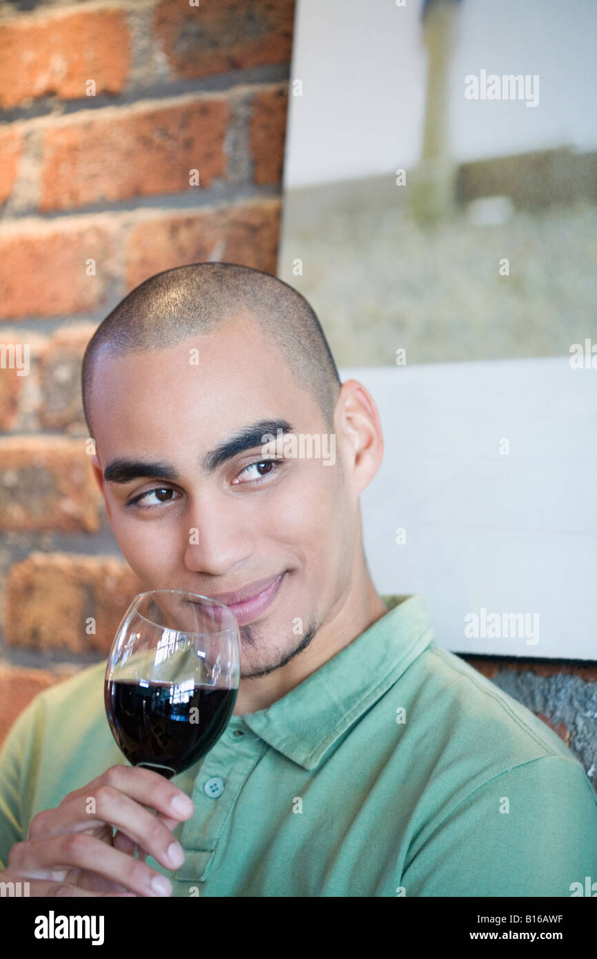 African American man drinking wine Stock Photo - Alamy