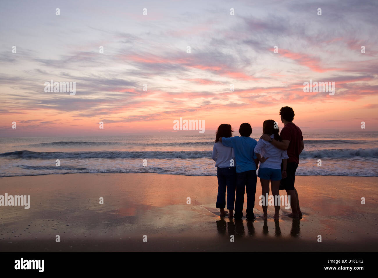 Mixed Race family at beach Stock Photo Alamy