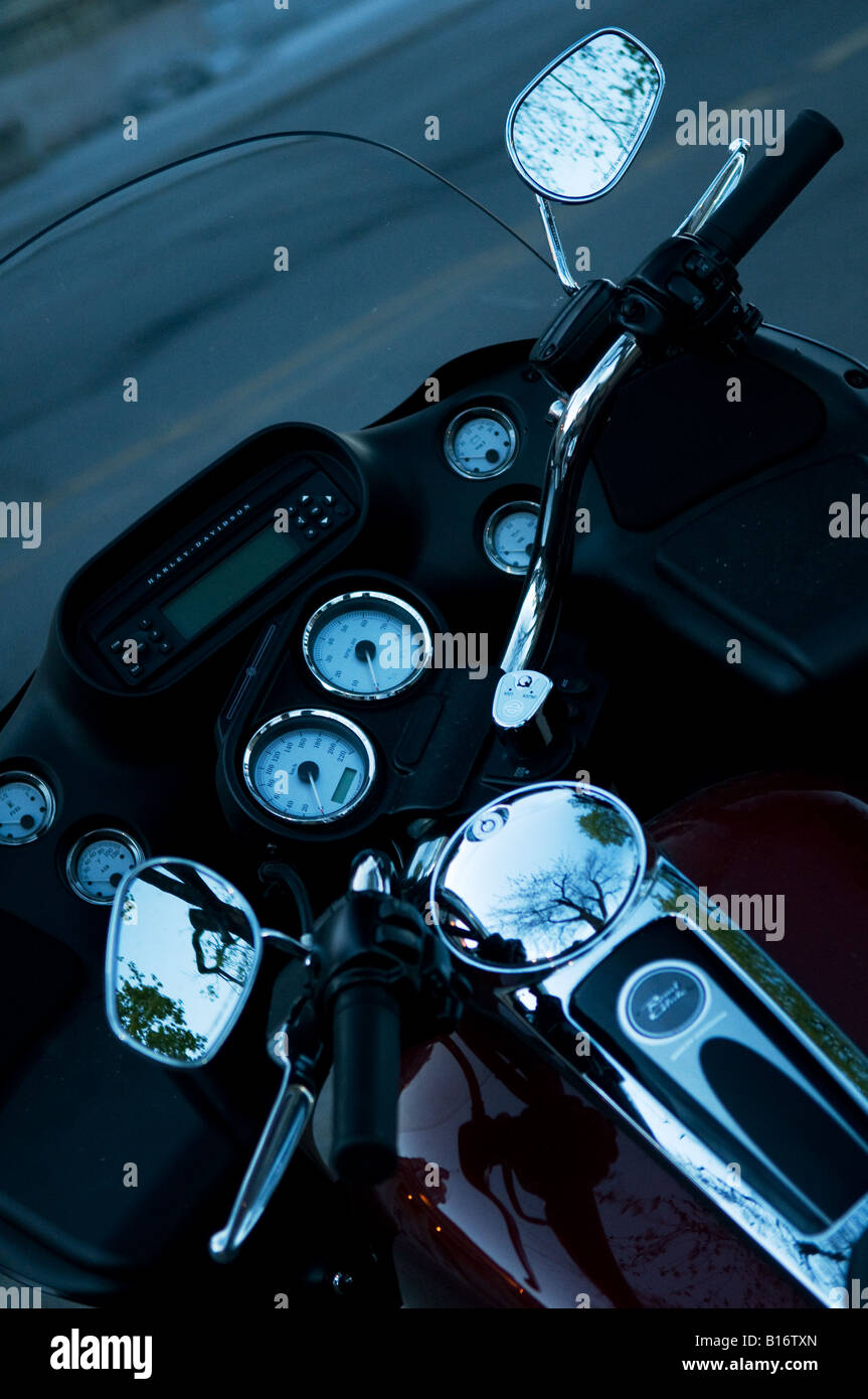 The chrome handle bars and gauges of a Harley Davidson motorcyle. Stock Photo
