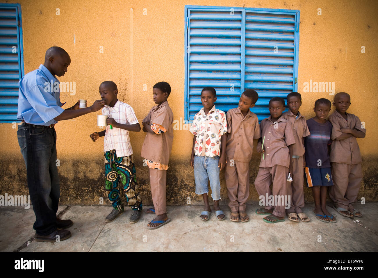 Children are given de-wormer at the Nyassia primary school in the village of Nyassia Senegal Stock Photo