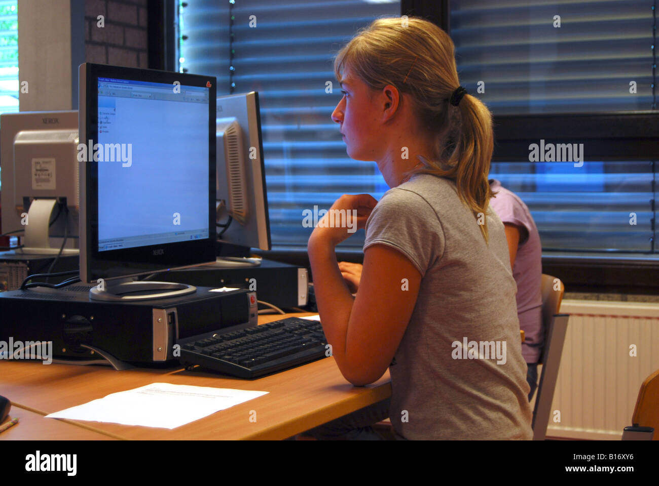 schoolgirl doing her schoolwork on computer Stock Photo - Alamy