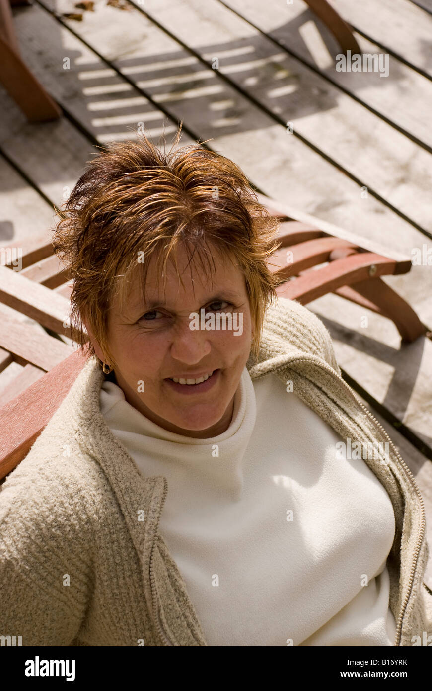 mature woman in garden Stock Photo - Alamy