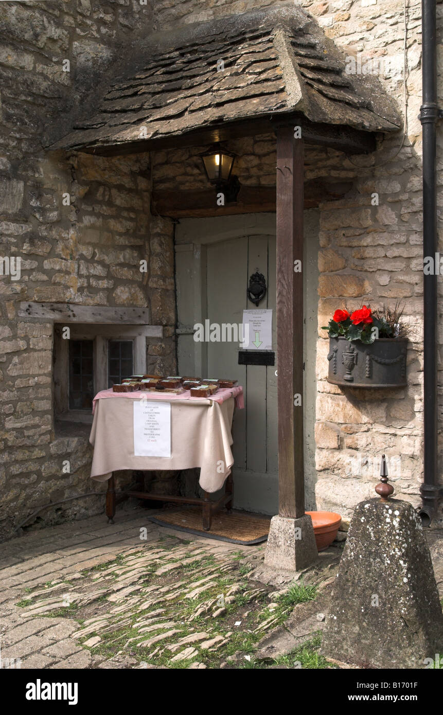 House in Castle Combe selling cakes on the doorstep, The Cotswold
