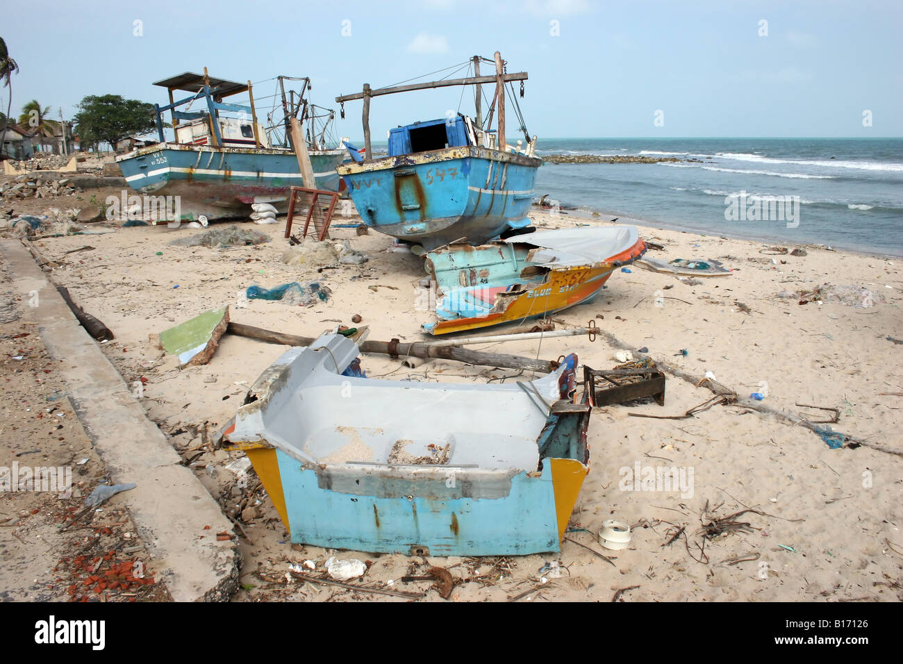 Boats swept ashore and destroyed by the 2004 Tsunami on Jaffna Peninsula, Sri Lanka. Stock Photo