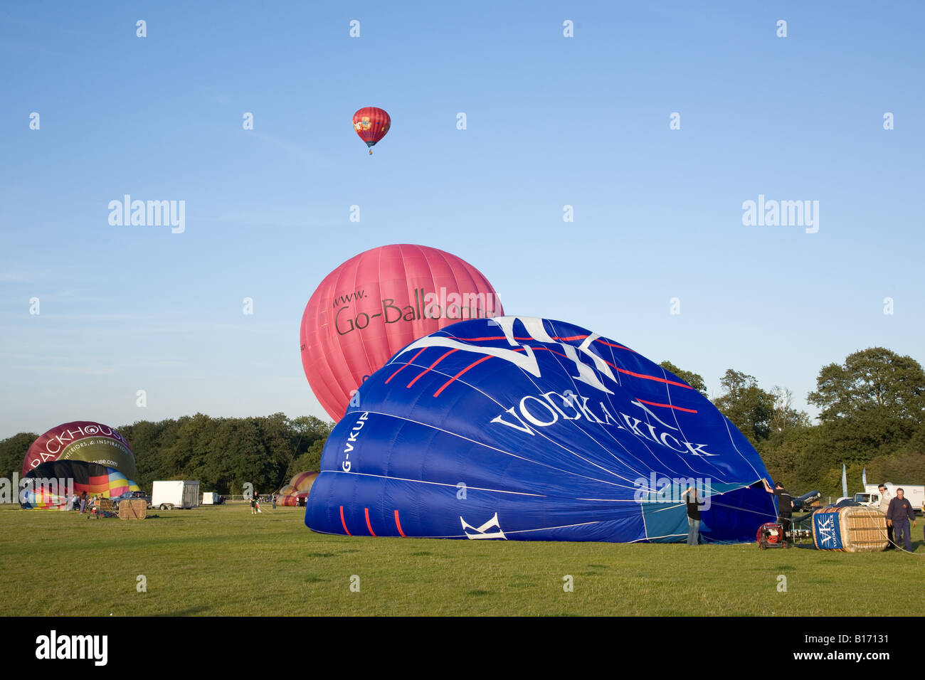 Hot air balloons prepare for take off Stock Photo