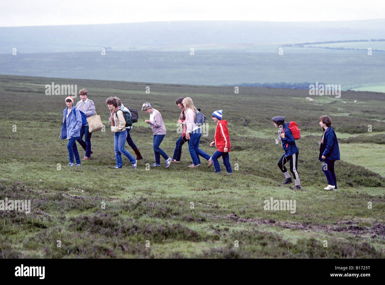 Children  do a field trip day hike on a moor in Cornwall Stock Photo