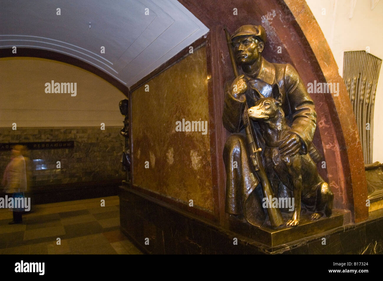 Statue of border guard and dog at Plochad Revolyutsi Metro Station