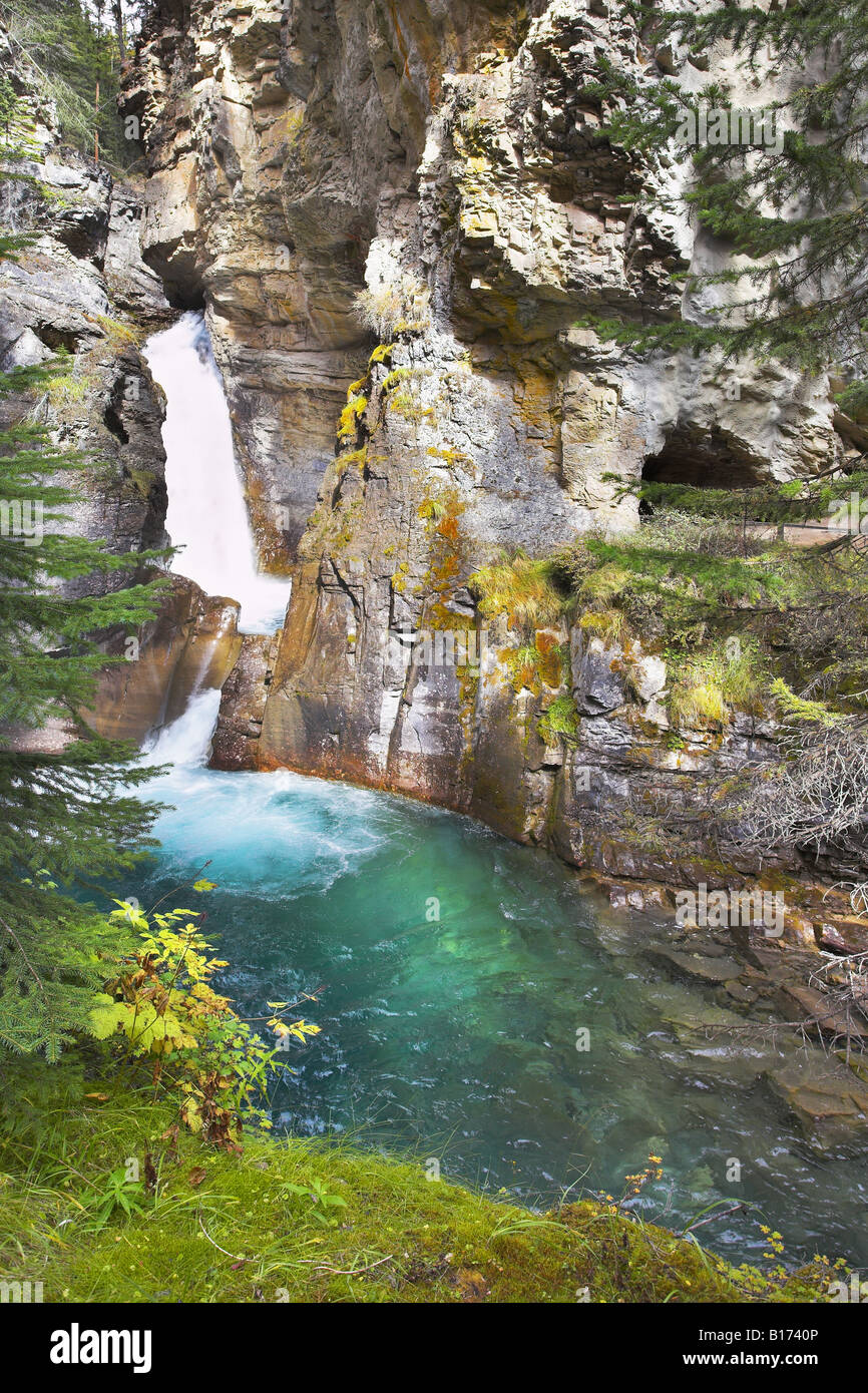 Magnificent falls with greenish water in mountains of Canada Stock Photo