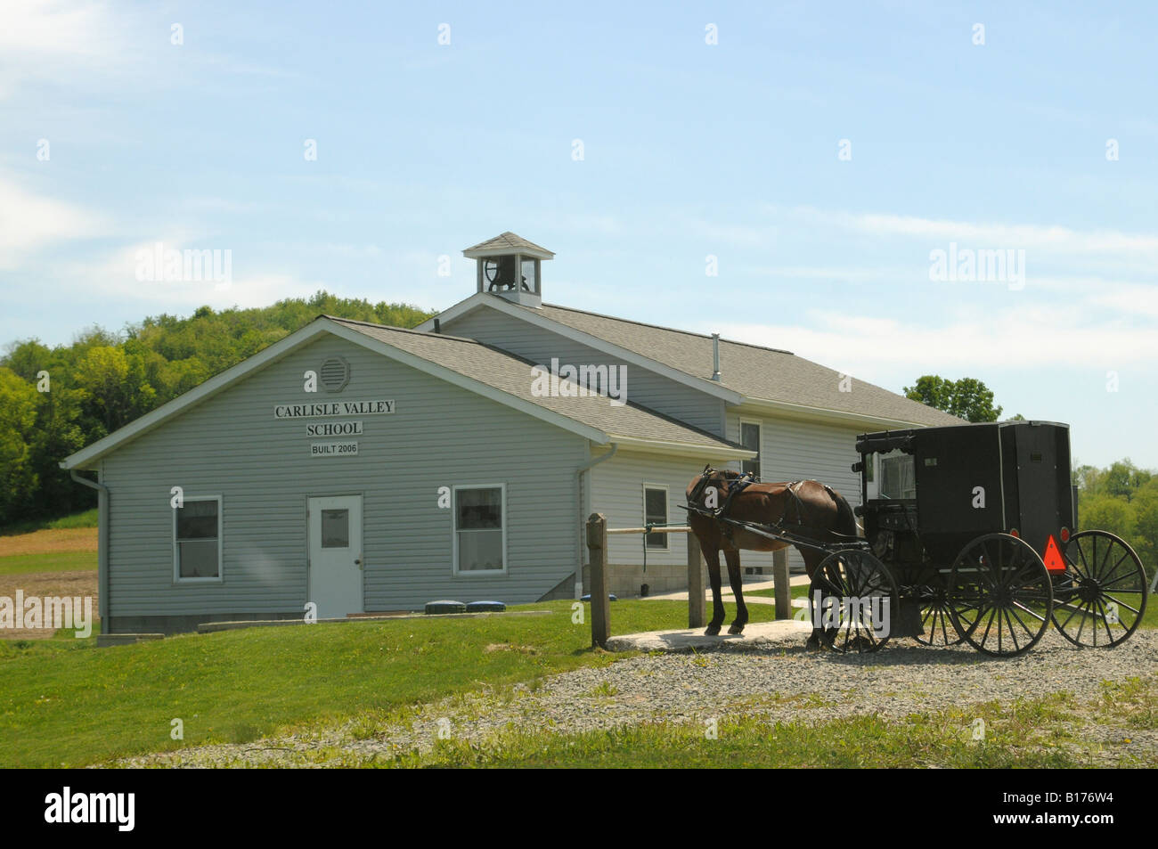 Buggy parked at Amish country school Stock Photo