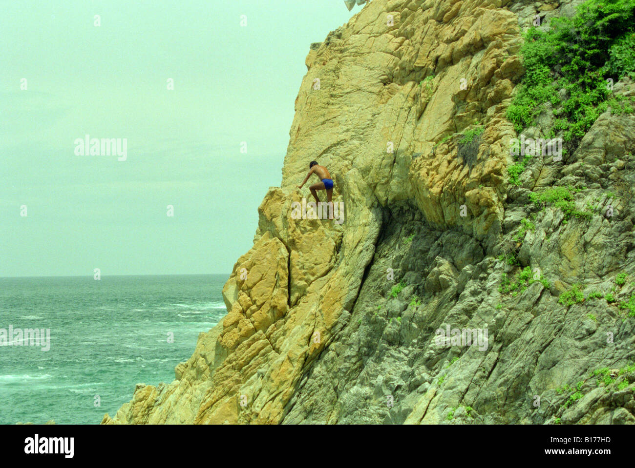 Acapulco. Man diving from La Quebrada. Stock Photo
