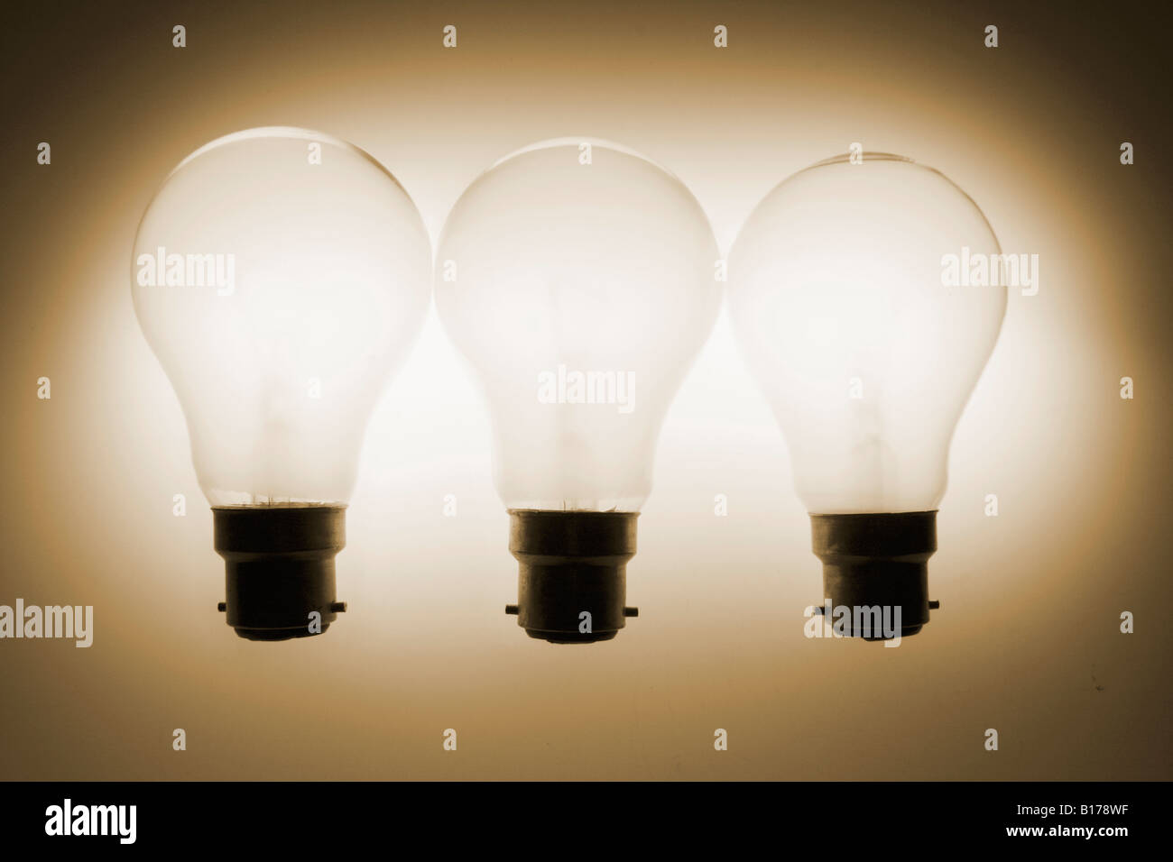 Three Ligth Bulbs in Warm Tone Stock Photo