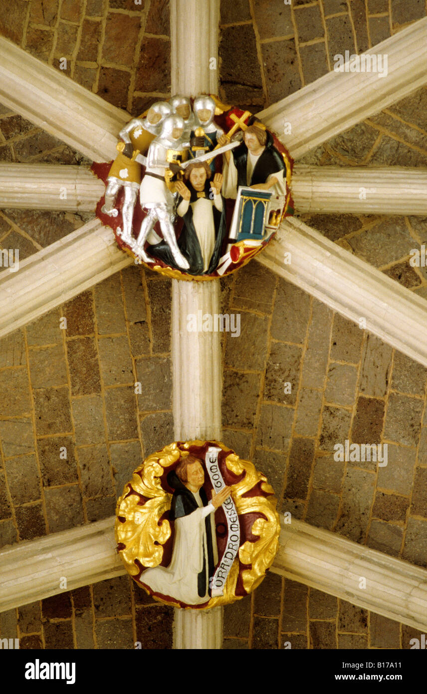 Exeter Cathedral interior Nave roof boss murder of Thomas a Becket painted English Medieval carvings history rib vault ceiling Stock Photo