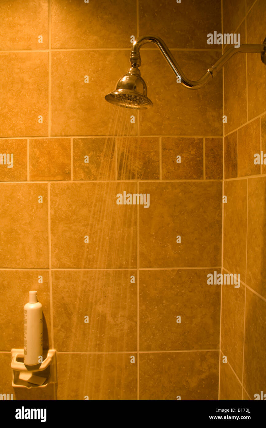 Tiled Shower with Water Flowing from Showerhead Stock Photo - Alamy