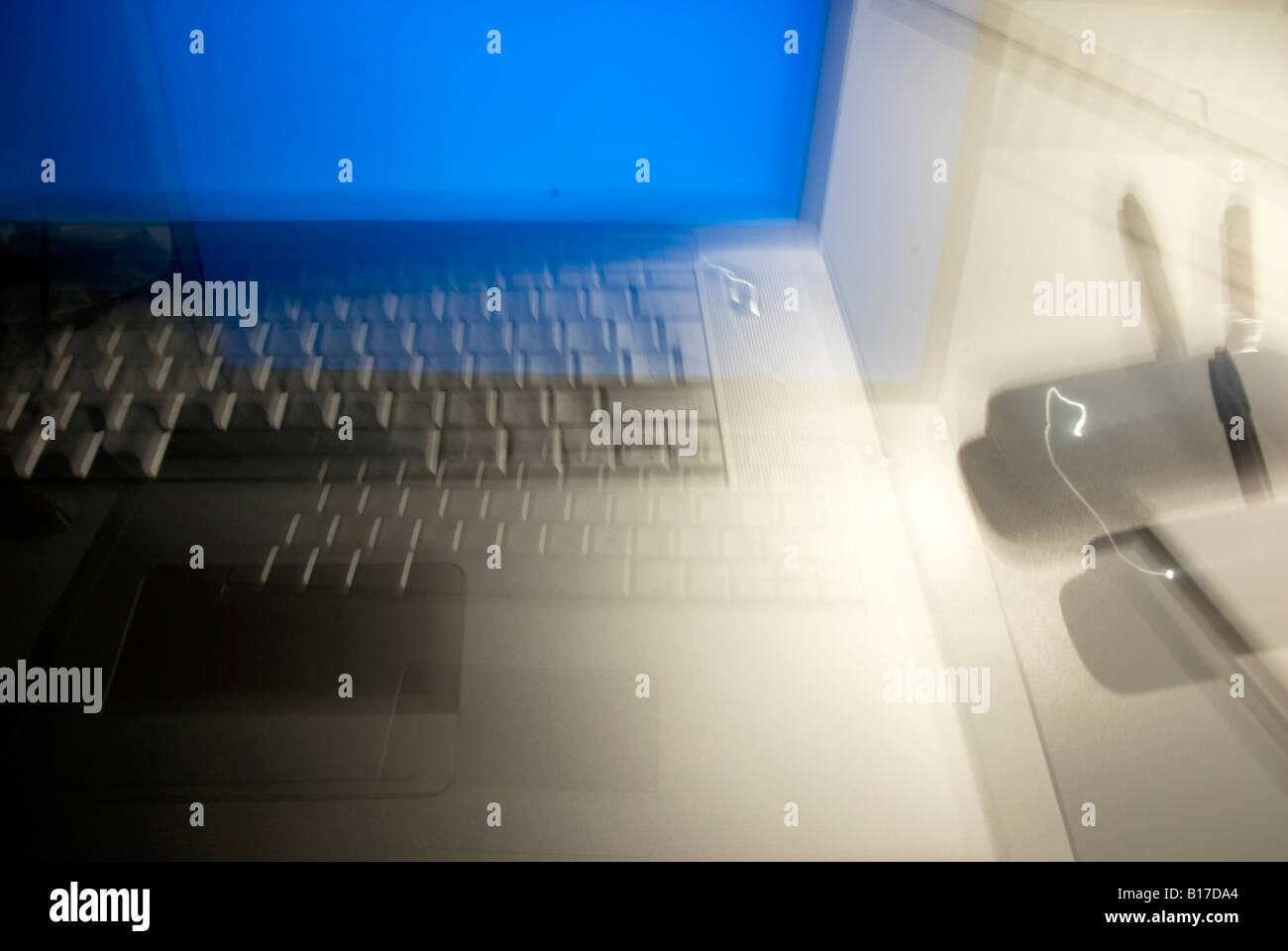 Macbook computer blurry with blue screen Stock Photo Alamy