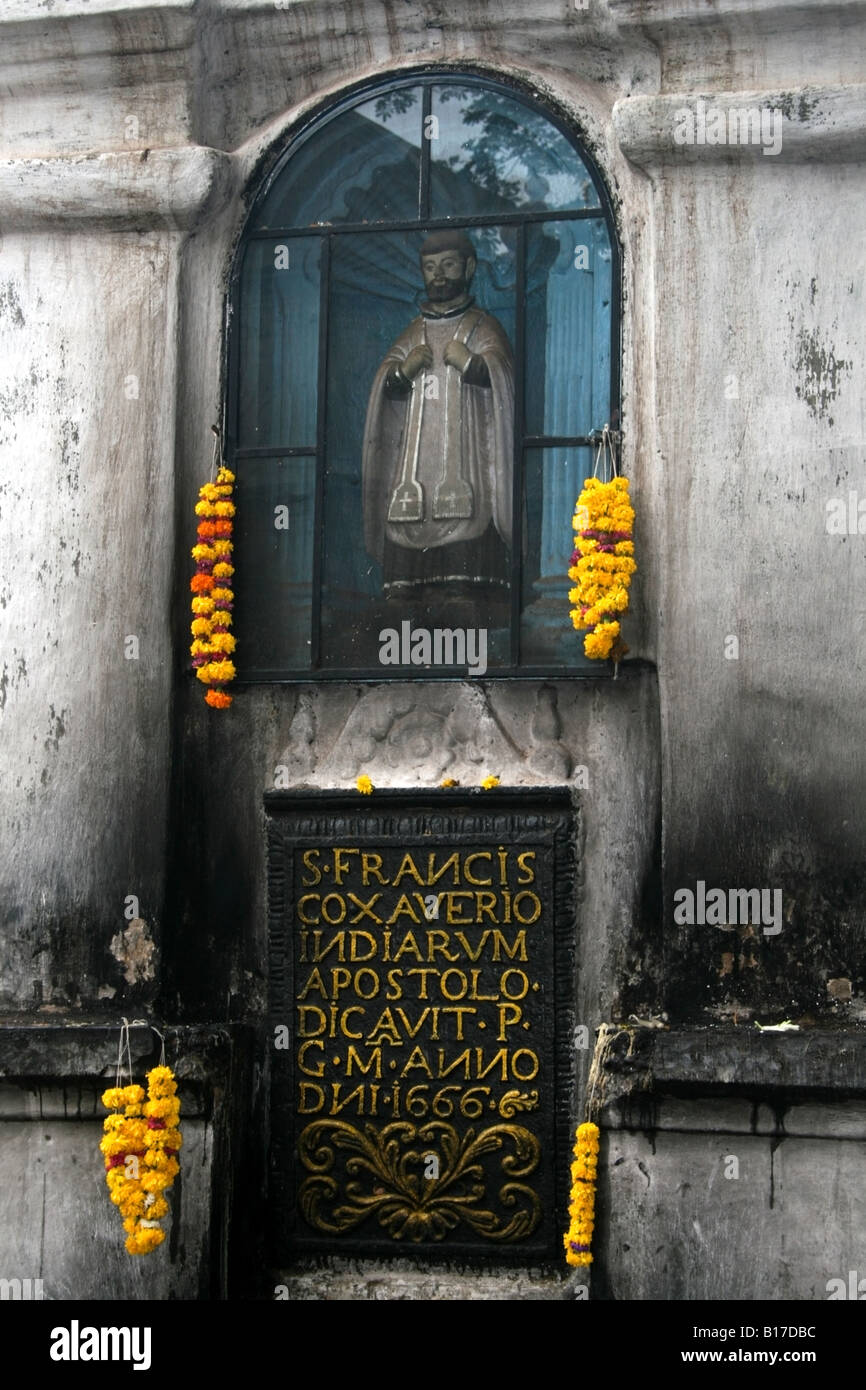 Small shrine dedicated to St . Francis Xavier with Hindu style flower
