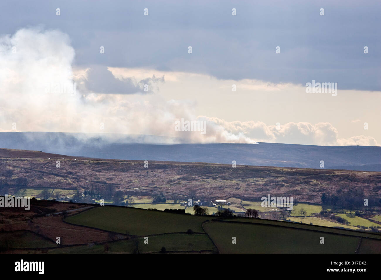 Burning heather in the North York Moors National Park near Danby. UK Stock Photo