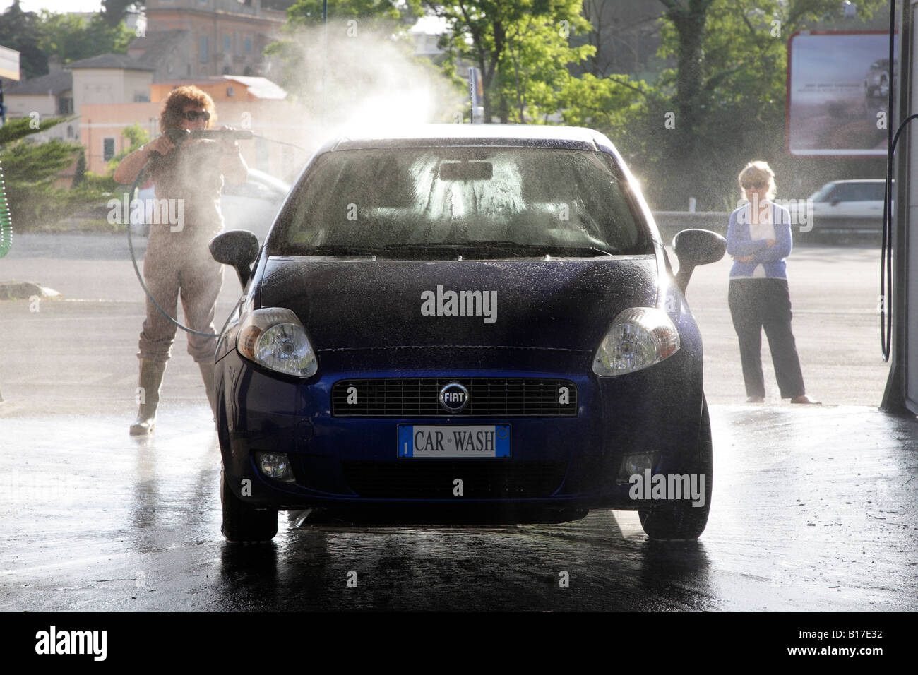 washing car in do it yourself car wash Stock Photo - Alamy