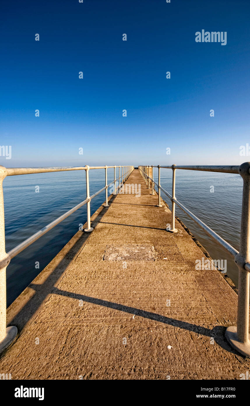 Concrete pier, Amble, Northumberland, England Stock Photo Alamy