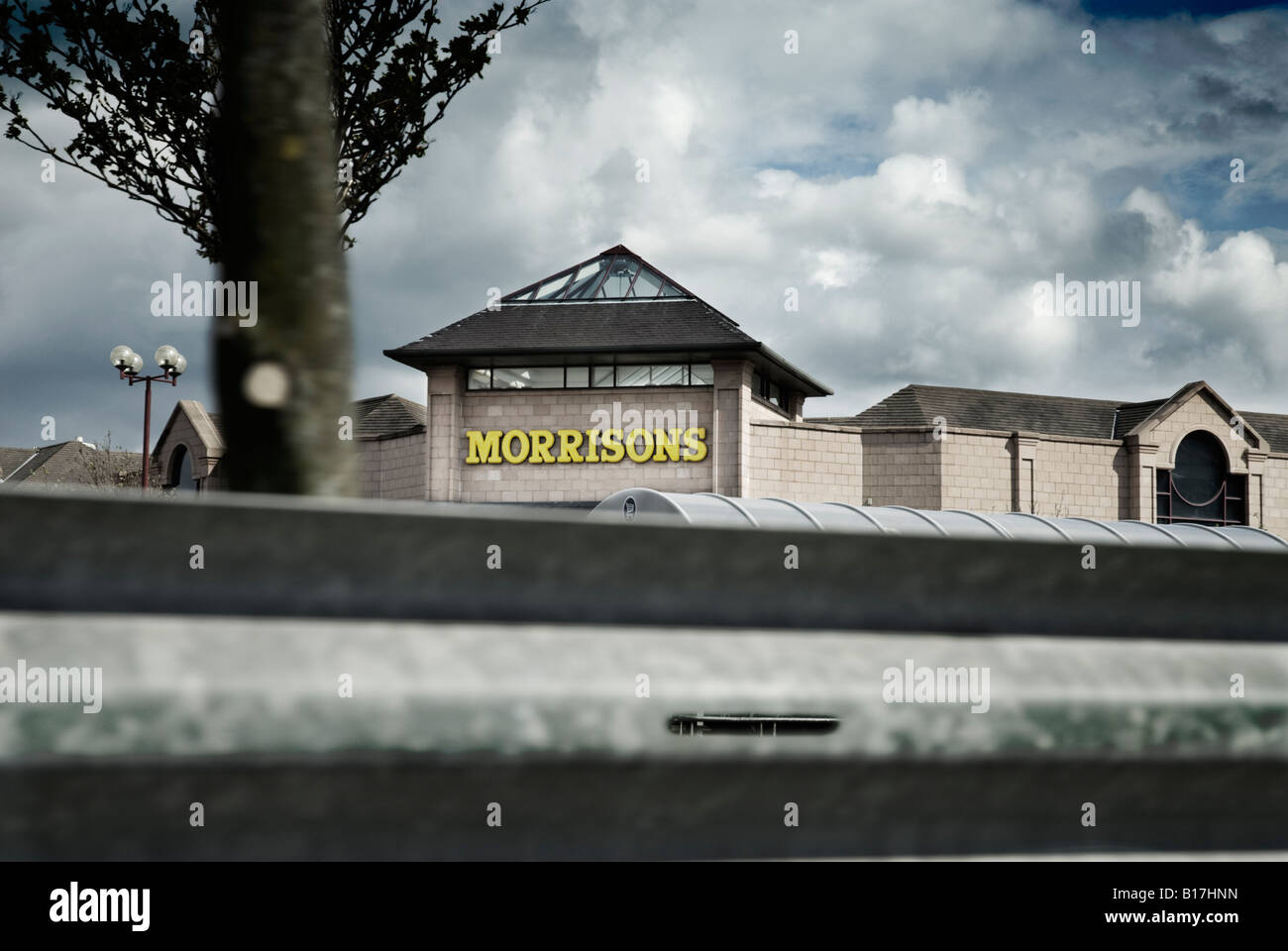 Morrisons supermarket in Edinburgh viewed over a road side barrier Stock Photo Alamy