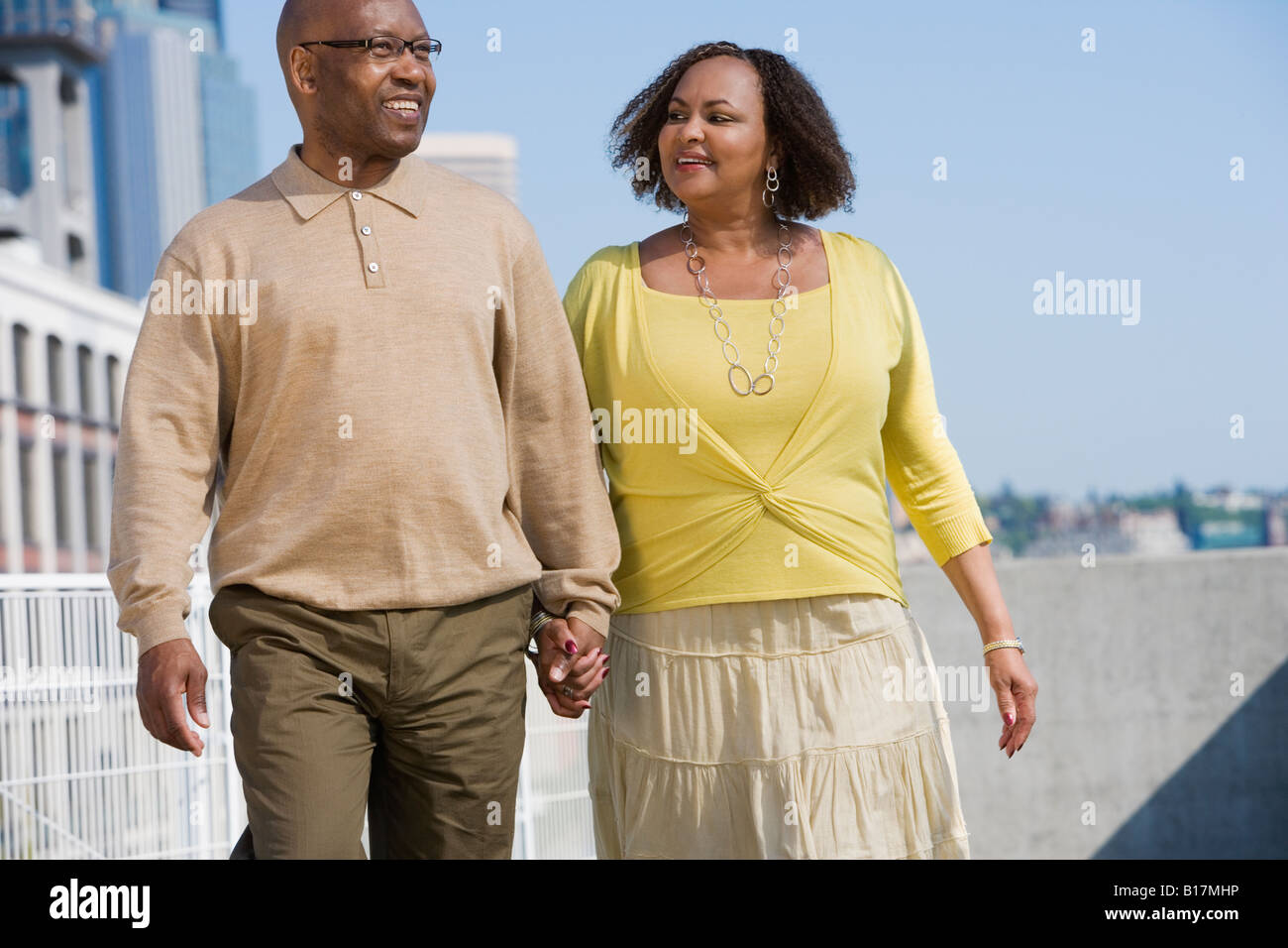 African American couple holding hands Stock Photo - Alamy