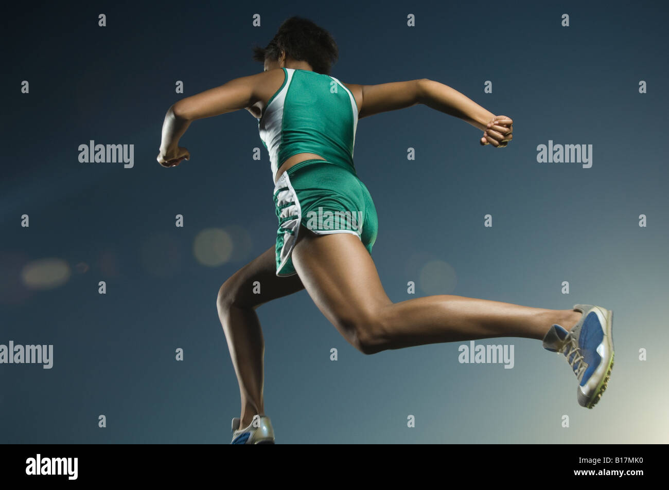 African American female athlete running Stock Photo