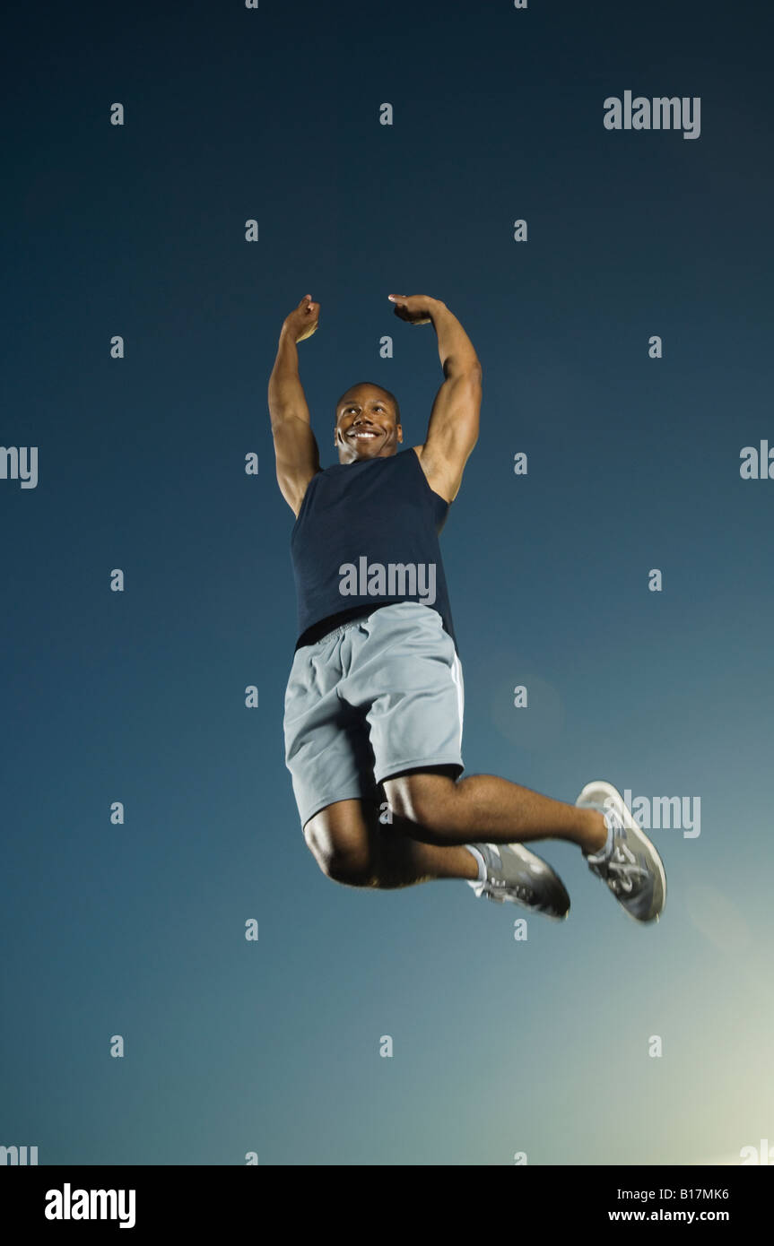 African American man jumping Stock Photo