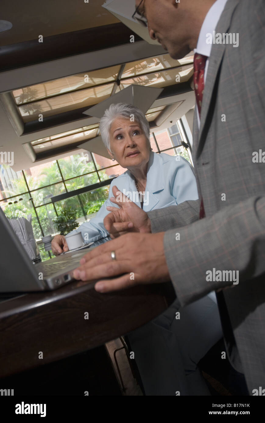 hispanic-businesspeople-in-cafe-stock-photo-alamy