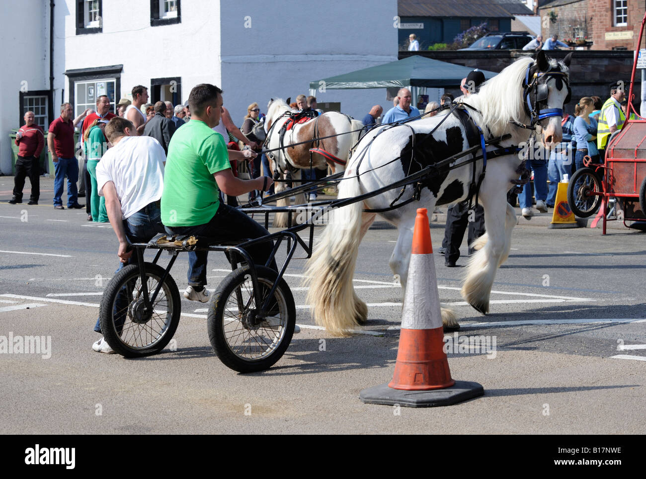 Gypsy travellers with trotting horse and trap. Appleby Horse Fair. Appleby-in-Westmorland, Cumbria, England, United Kingdom. Stock Photo