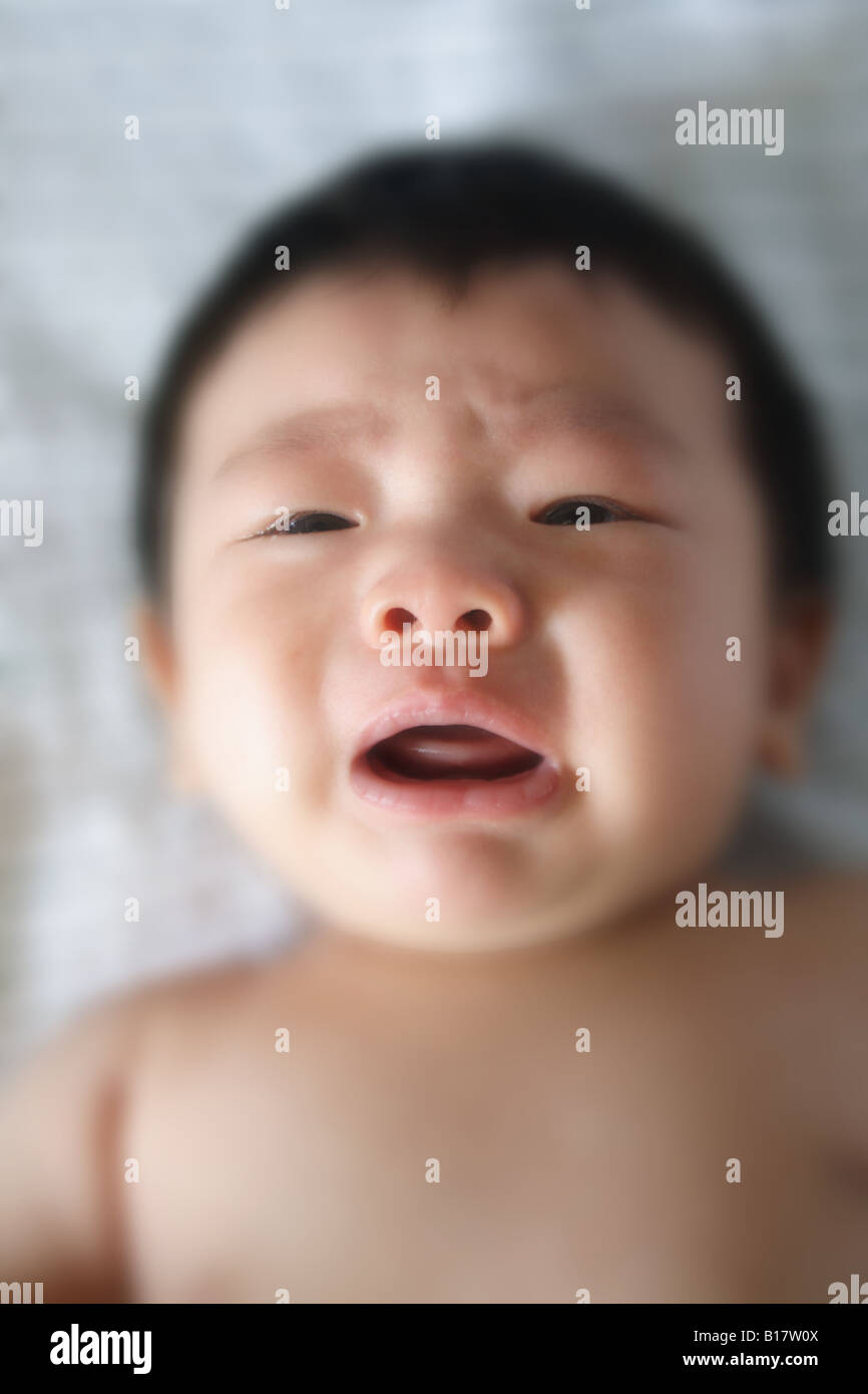 Baby crying facial expression Stock Photo Alamy