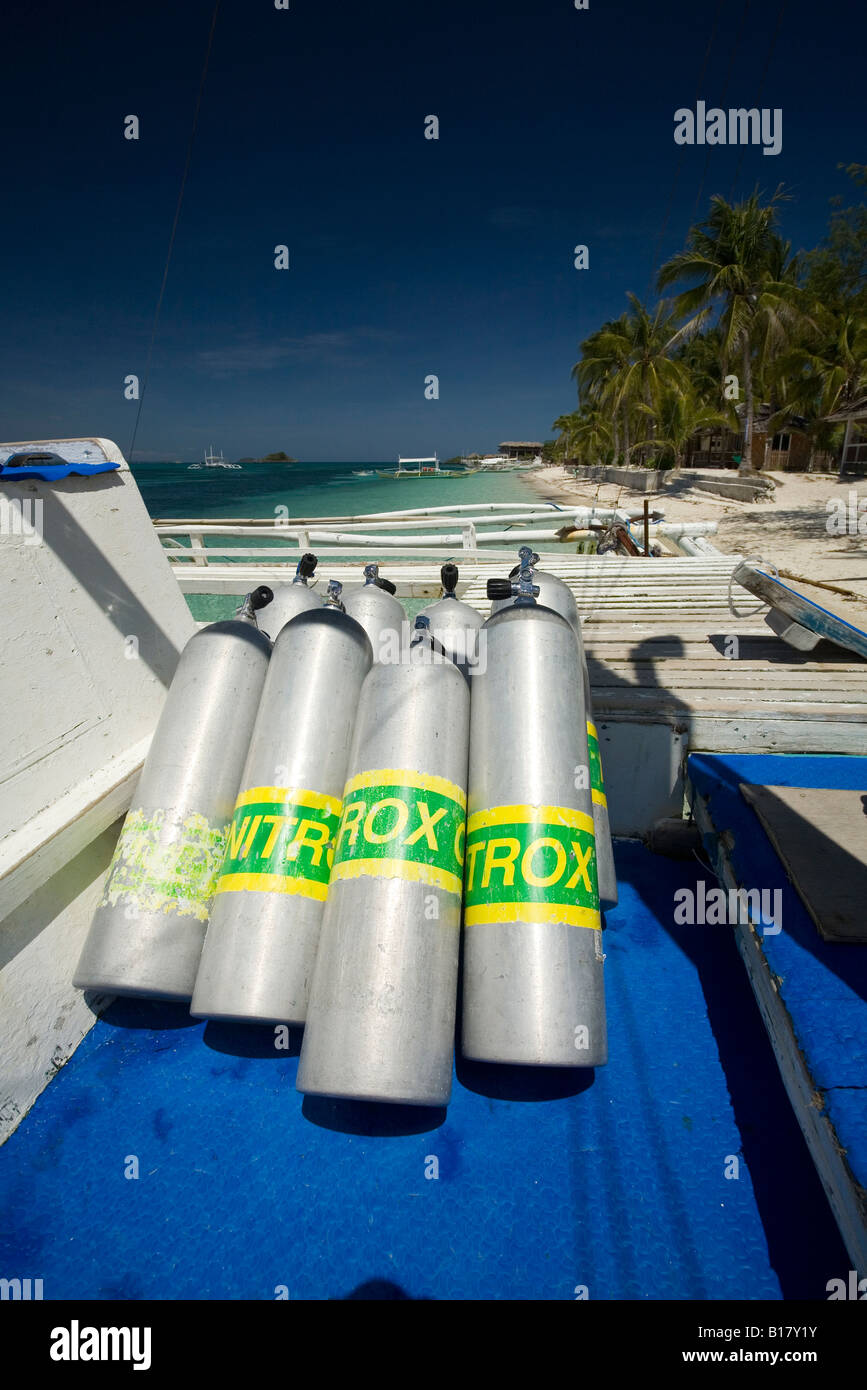 nitrox tanks on diving boat Island Malapascua Cebu Philippines Stock Photo