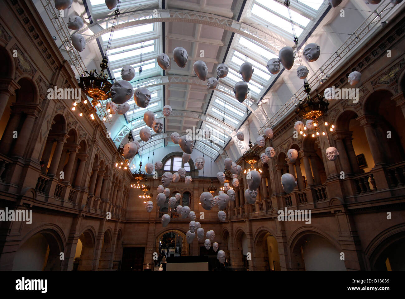 Masks Hanging From The Ceiling Of The Kelvingrove Museum And