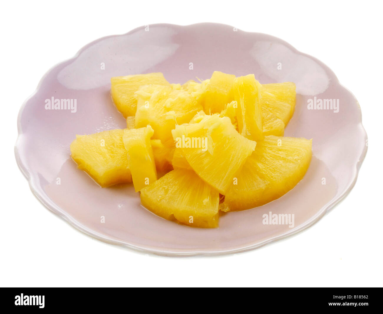 Pineapple Chunks With Ginger Stock Photo - Alamy