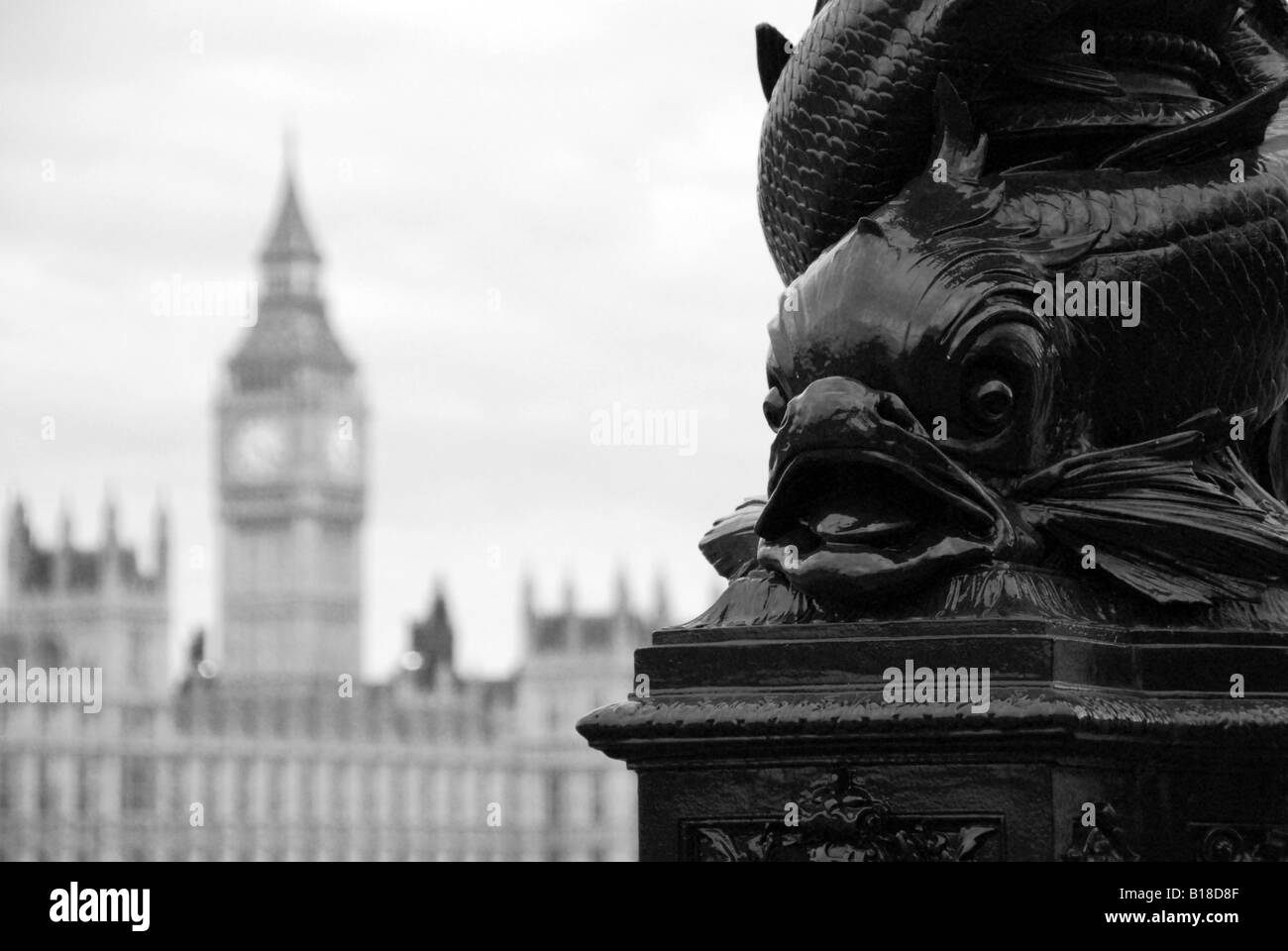 Victorian lamp standard on Albert Embankment, London with Houses of Parliament in background Stock Photo