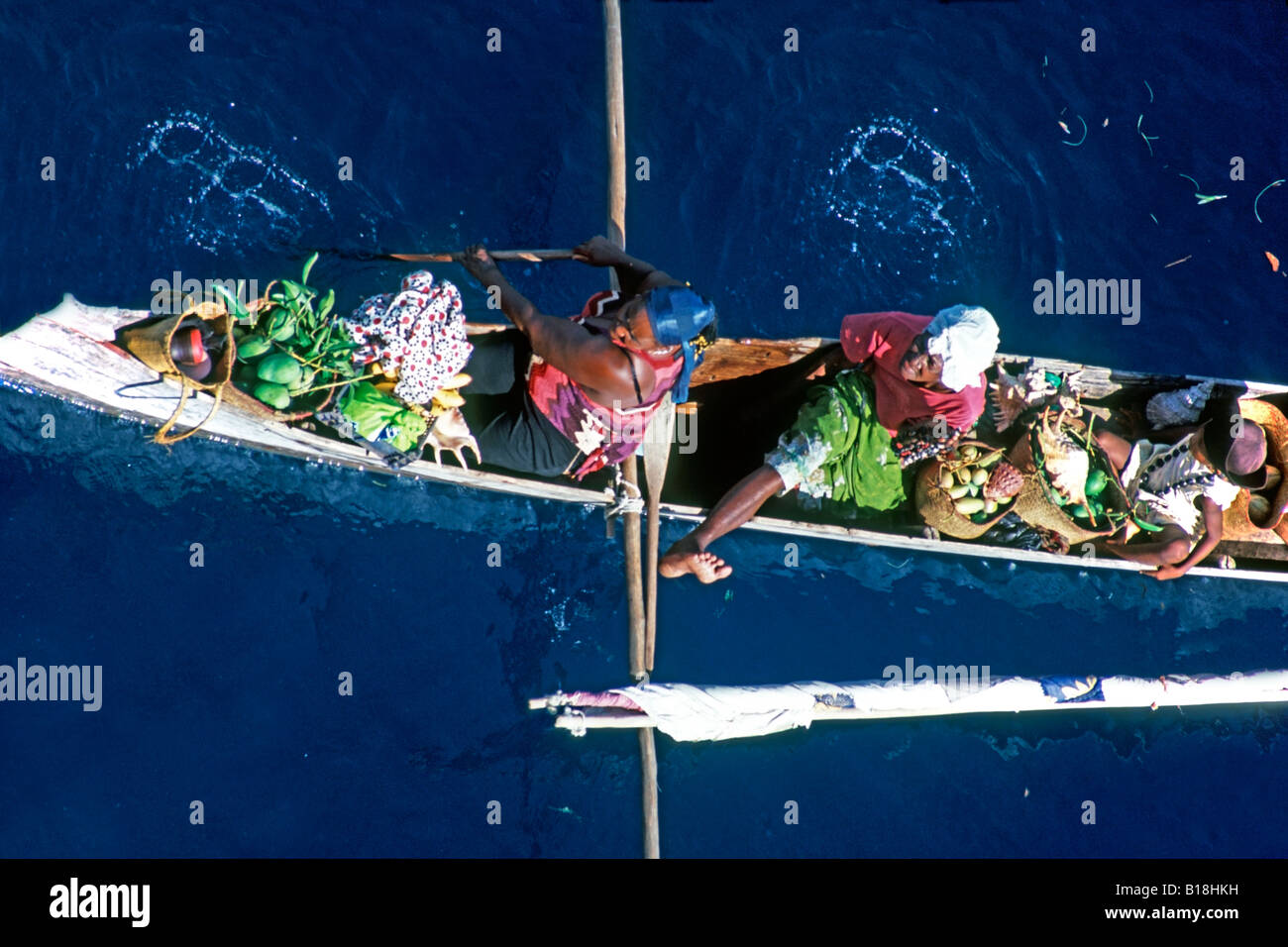Local Malagasy people selling from boat Nosy Be island Madagascar Indian Ocean Stock Photo