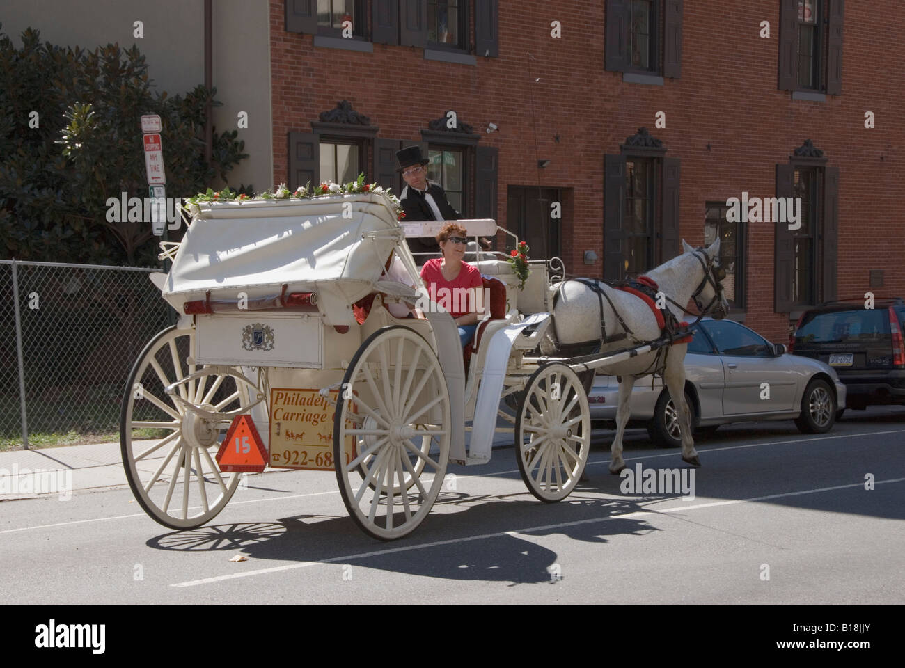 Horse and Carriage carrying sightseers in Philadelphia Stock Photo