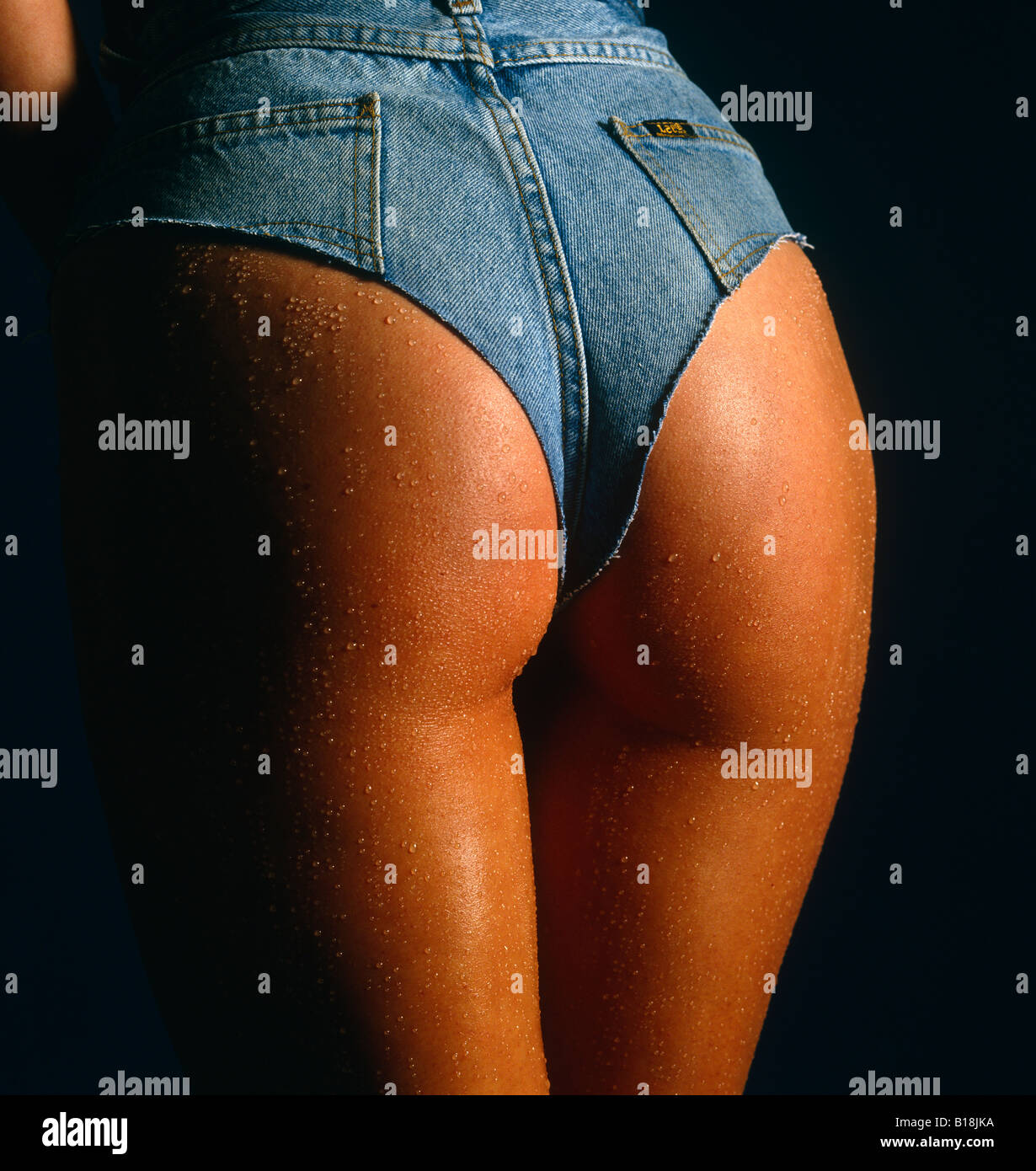 Sexy ass and thighs, toned behind in white thong facing away from the  camera, shoulders down shot Stock Photo - Alamy