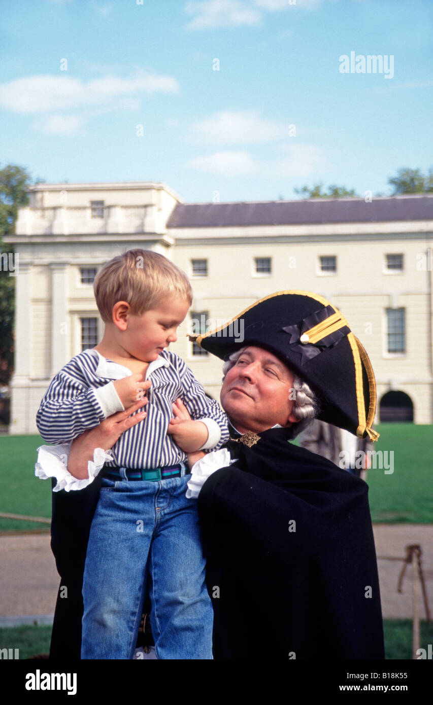 Costumed Nelson actor with child outside Maritime Museum Greenwich London  England UK Stock Photo