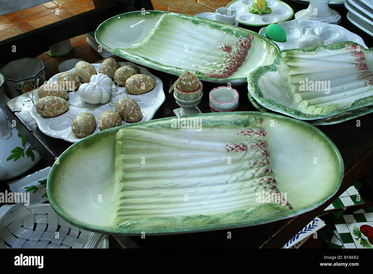 Local ceramic plate for asparagus and eggs, typical fare in Bassano del Grappa, Veneto, Italy Stock Photo