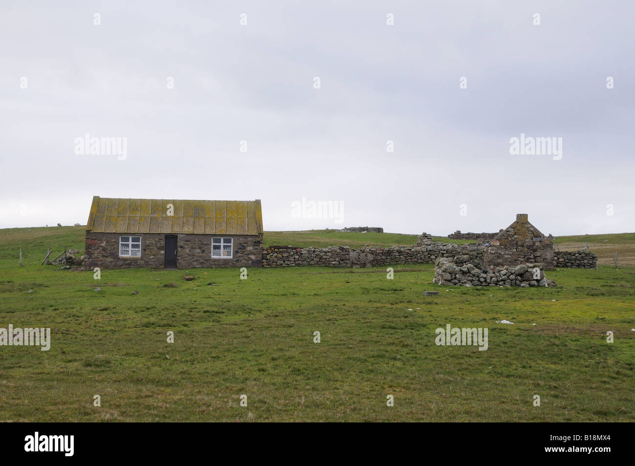 Shetland croft. In Shetland, people use stones as their primary building material. There are almost no trees. Stock Photo