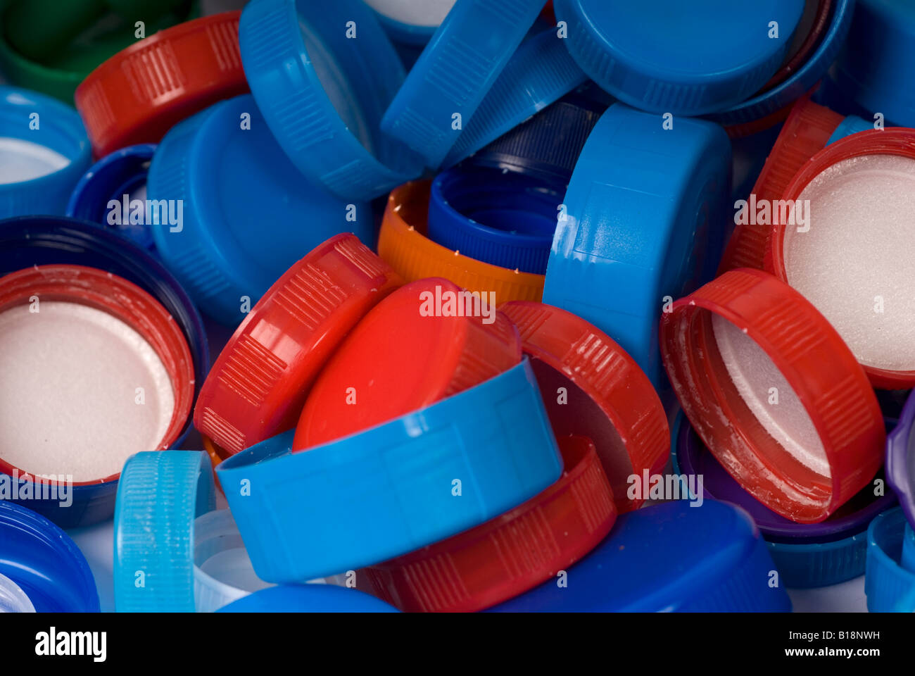 Stock photo of a pile of plastic caps for bottles The caps are saved