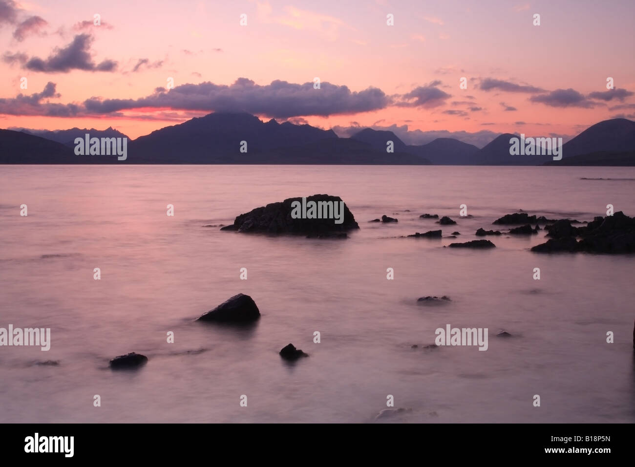 The Cuillin Mountains at Sunset From Ob Gauscavaig Bay Isle of Skye Scotland Stock Photo